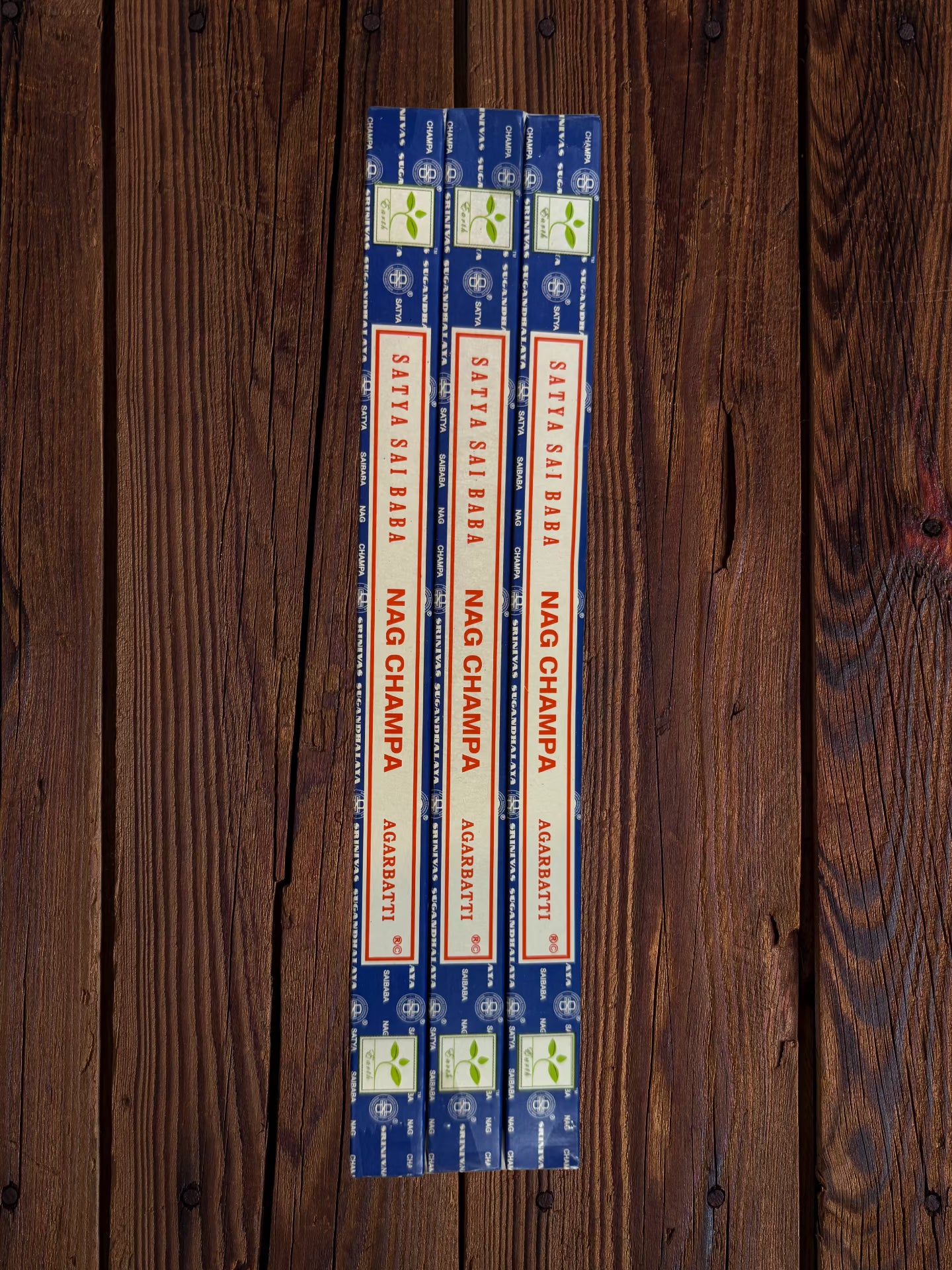 Three Satya Sai Baba Nag Champa 10g incense packages arranged side by side