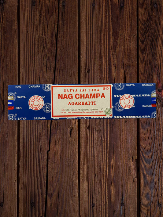 Single Satya Sai Baba Nag Champa 40g incense package on a wooden background