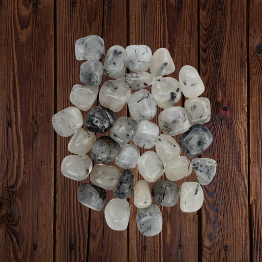 Polished Tourmalinated Quartz tumble stones with black tourmaline inclusions – protection and grounding crystal
