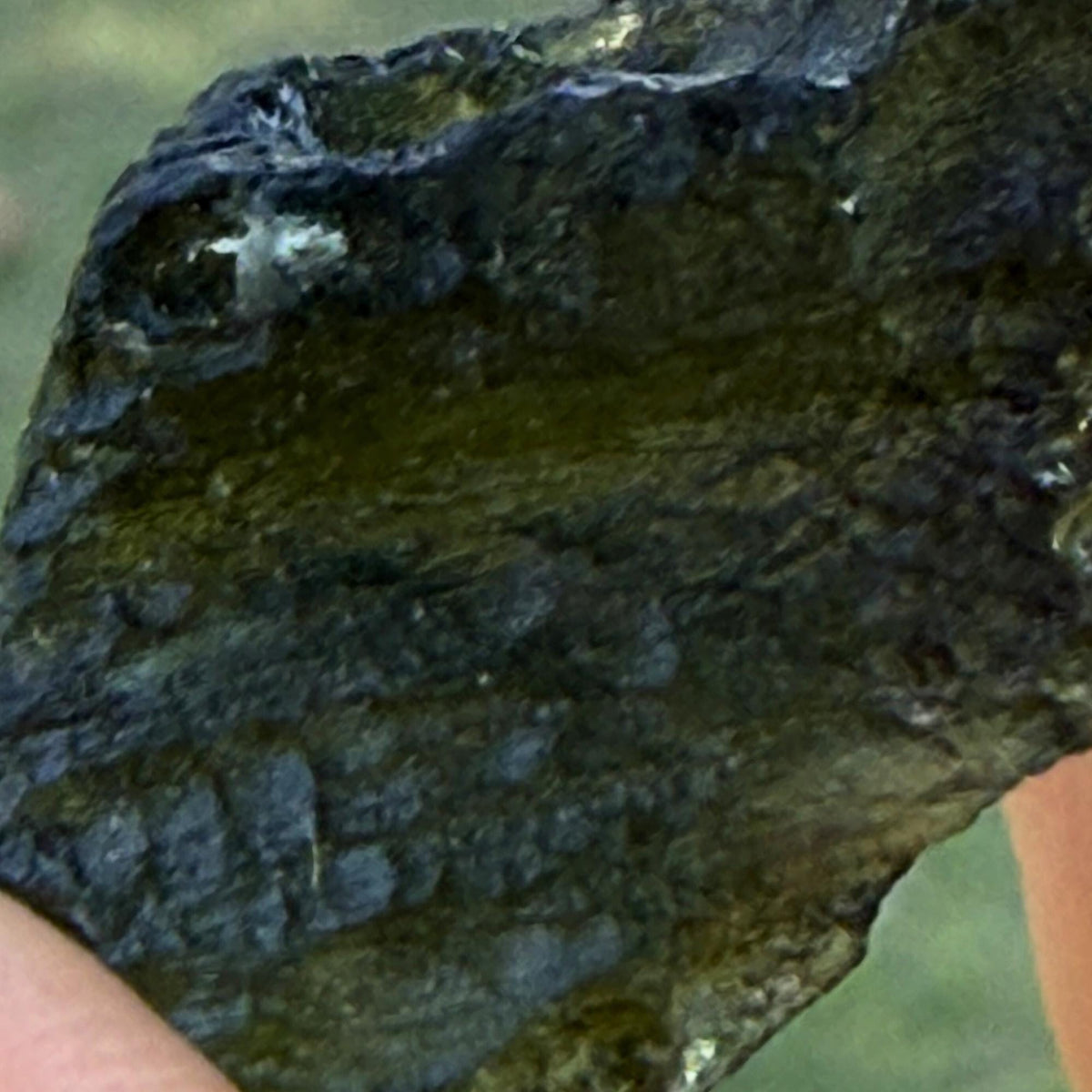 natural Czech Moldavite raw stone closeup