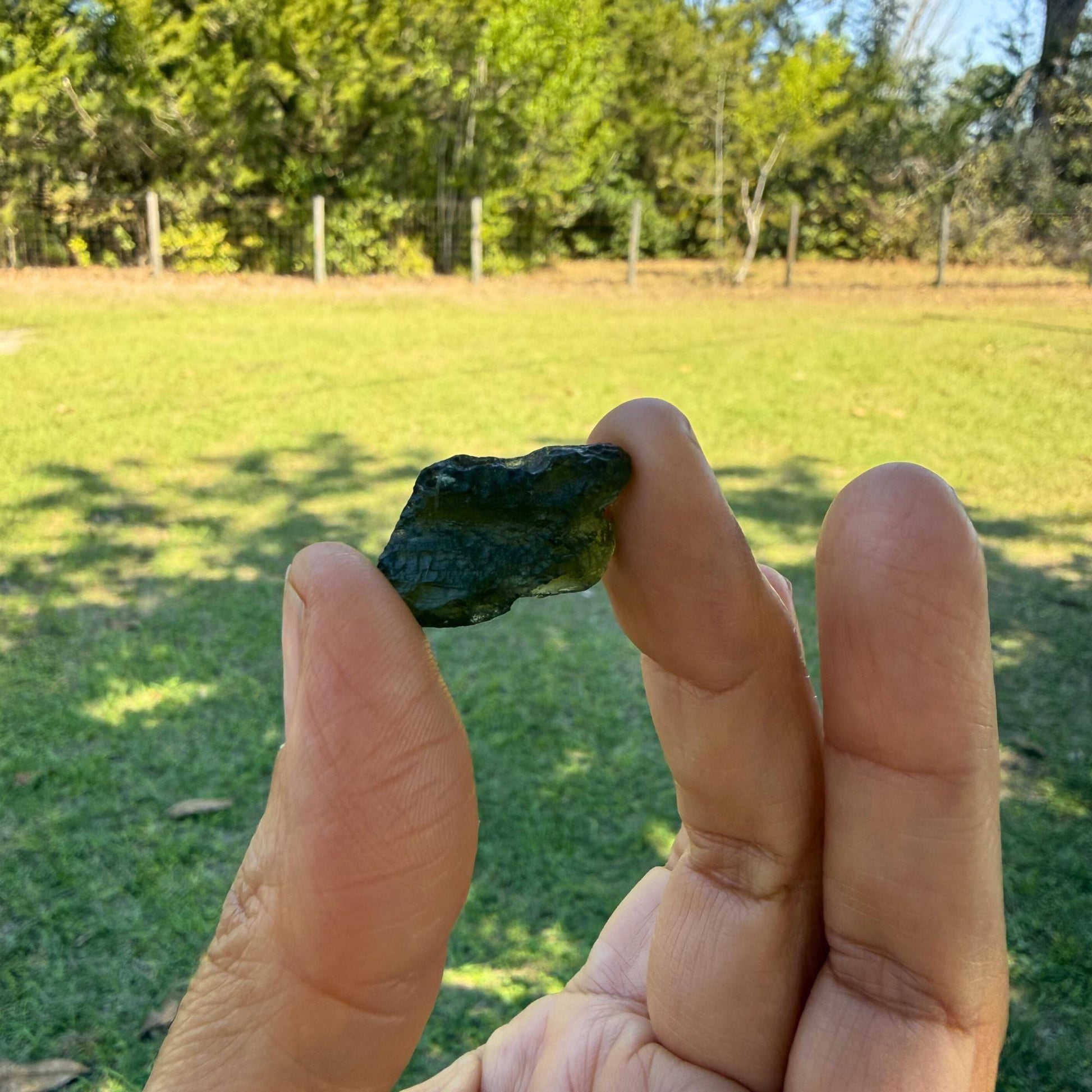 showing a genuine raw Moldavite 4g Czech tektite 