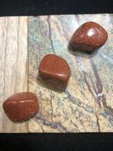Red Goldstone Tumbled stone- Confidence and ambition