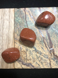 Red Goldstone Tumbled stone- Confidence and ambition