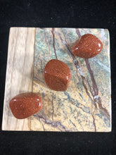 Red Goldstone Tumbled stone- Confidence and ambition